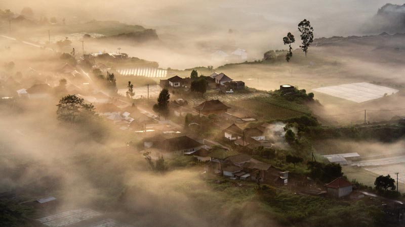 Misty morning over the highlands of Kintamani, Bali