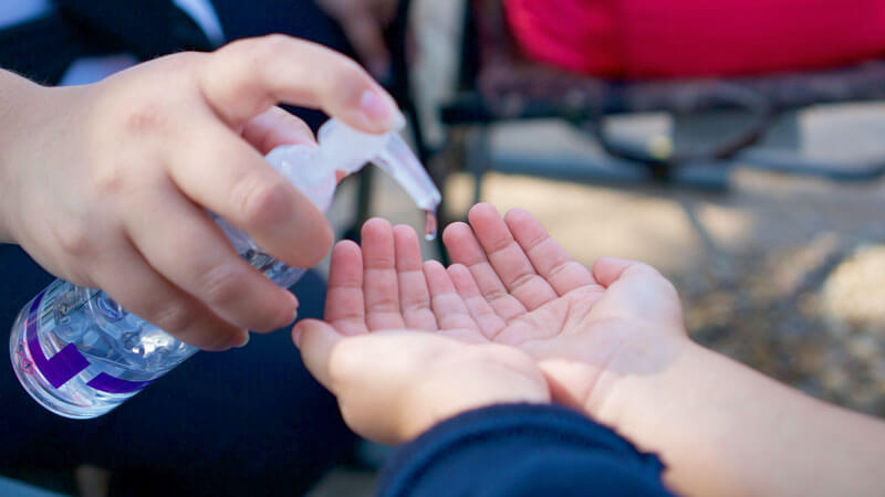 Use hand sanitizer to clean children's hands. Travel Tips To Bali With Toddlers, Babies, and Children