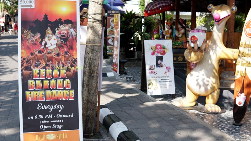 Advertisement for the Kecak Barong Fire Dance performance at Tanah Lot with ticket pricing