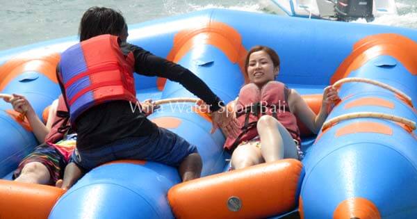 Adventure-seekers experiencing the thrill of the Inflatable Wing Ride.