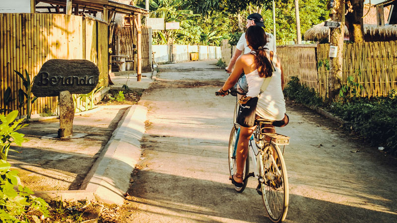 Visitors cycling around Gili Trawangan's scenic paths