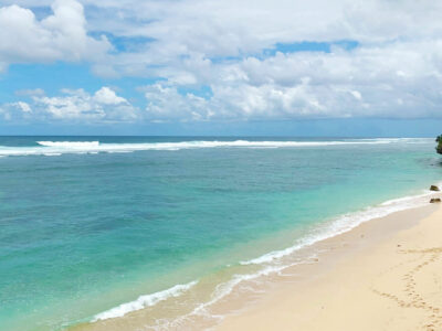 Secluded Gunung Payung Beach with pristine sands and clear waters in Bali