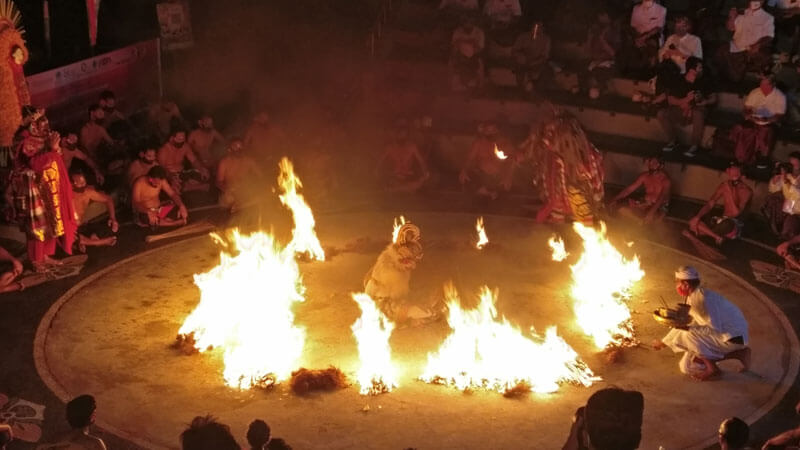 Fiery Kecak dance performance at Uluwatu Temple, a highlight of Bali's cultural experiences.