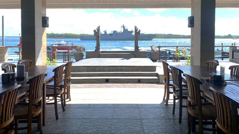 Seaside dining at Surya Cafe Grill in Tanjung Benoa with a view of the harbor.