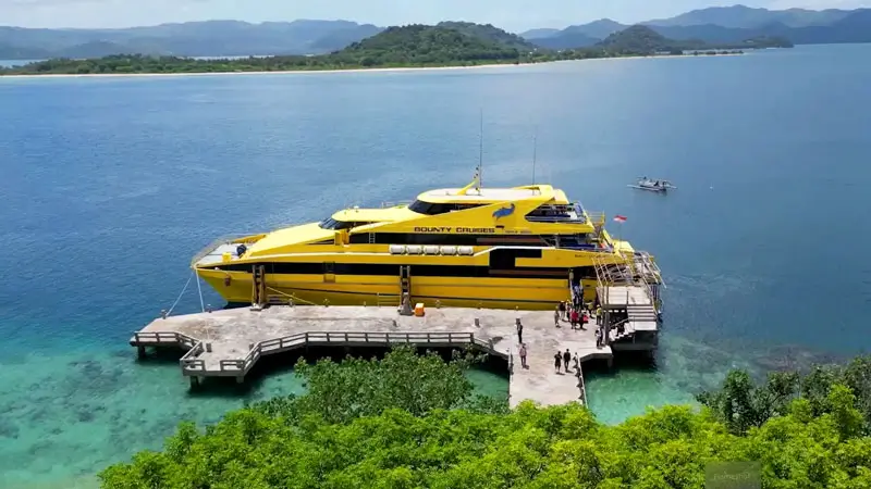 The Bounty Cruise Bali cruise ship docks at the pier.