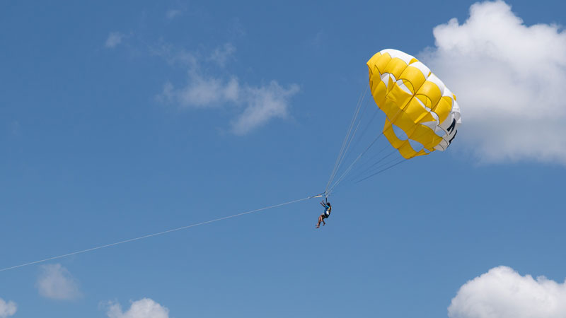 Parasailing in Tanjung Benoa in the dry season with sunny weather
