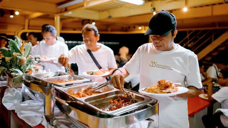 Guests enjoying an international buffet dinner on the Bali Bounty Sunset Dinner Cruise.