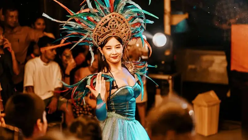 A vibrant cultural performance onboard the Bali Sunset Dinner Cruise Bounty, entertaining guests with music and dance.