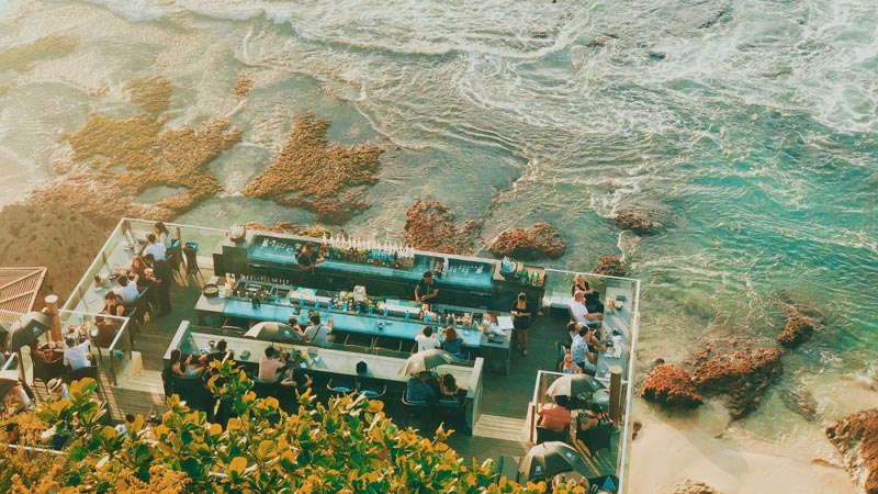 Oceanfront bar on cliffs near Jimbaran with sunset views