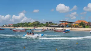 Banana boat Tanjung Benoa ride with group near beach
