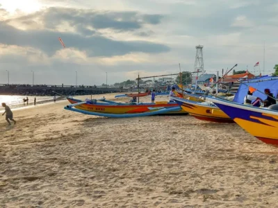 Fishing boats on the sand at Kedonganan Beach in the afternoon