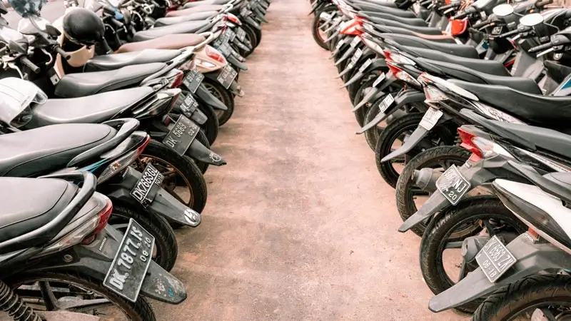 Motorbike parking near shoreline access in Canggu