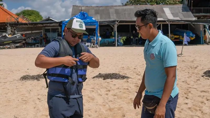 Safety briefing and life jacket fitting for Tanjung Benoa water sports package