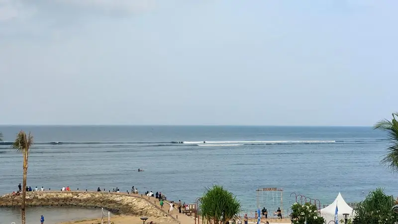 Sanur Beach seafront view with breakwater and promenade, Bali
