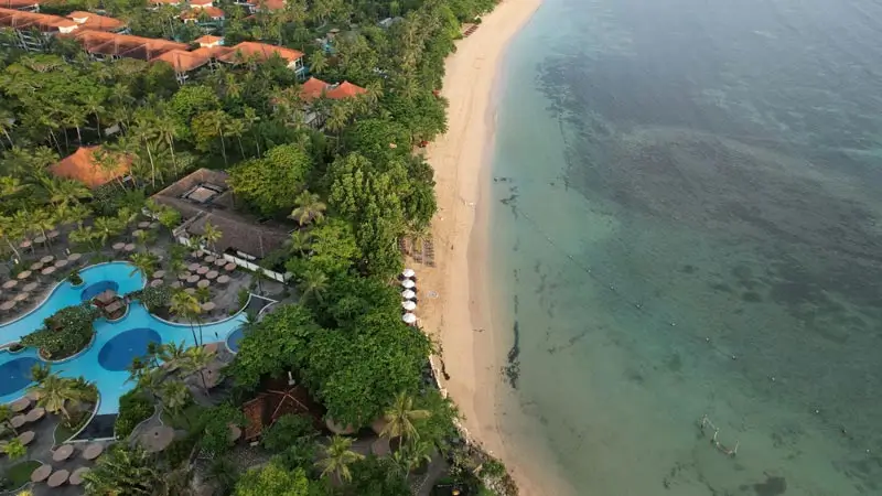 Aerial view of Nusa Dua shoreline, calm water and long beach