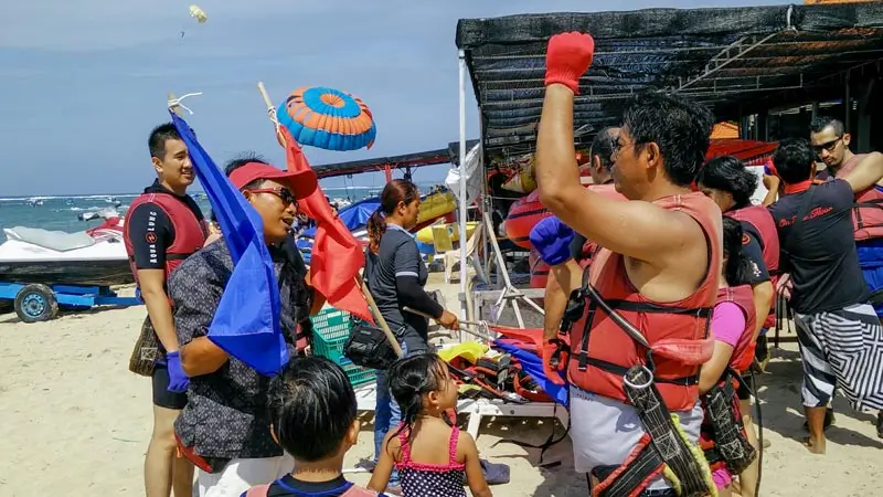 Safety briefing before starting water sports at the beach