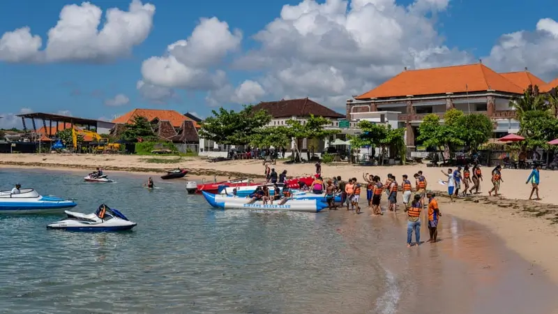Tanjung Benoa beach crowd gathering before water sports