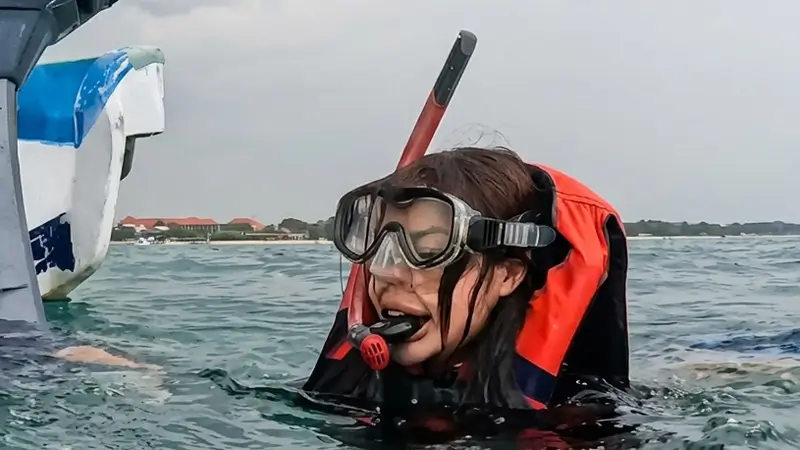Guest in life jacket during Sanur snorkeling activity