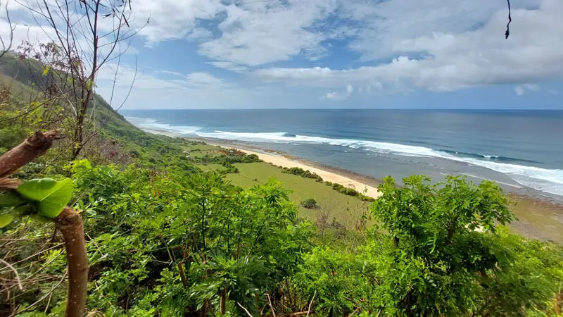 Nyang Nyang Beach seen from a green cliff viewpoint