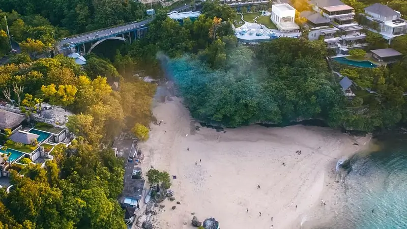 Aerial view of Padang Padang Beach with sand and clear water