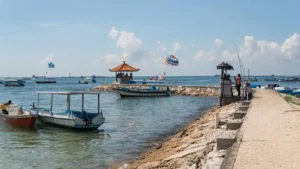 Tanjung Benoa Beach coastline with boats and a coastal path
